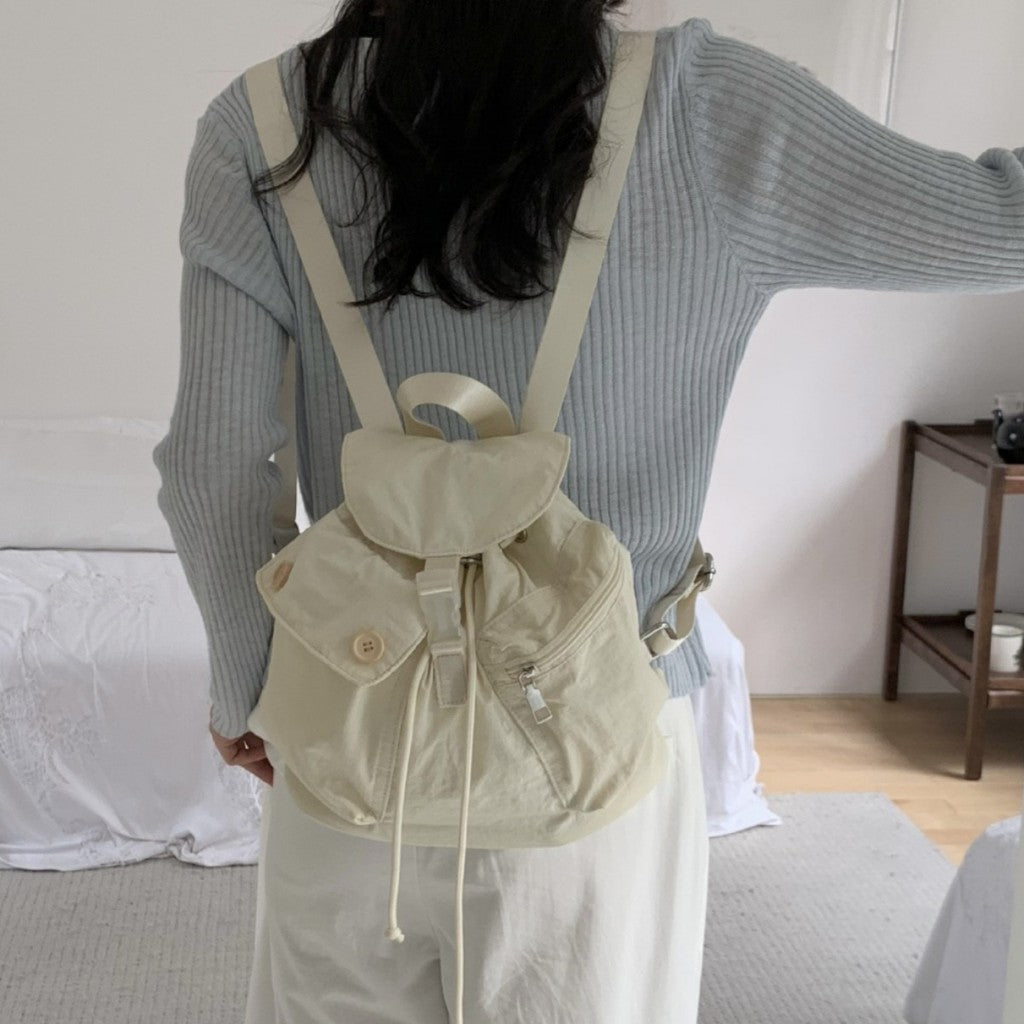 Ielgy New Style Korean Niche Design Outdoor Pocket Button Drawstring Backpack Nylon Backpack