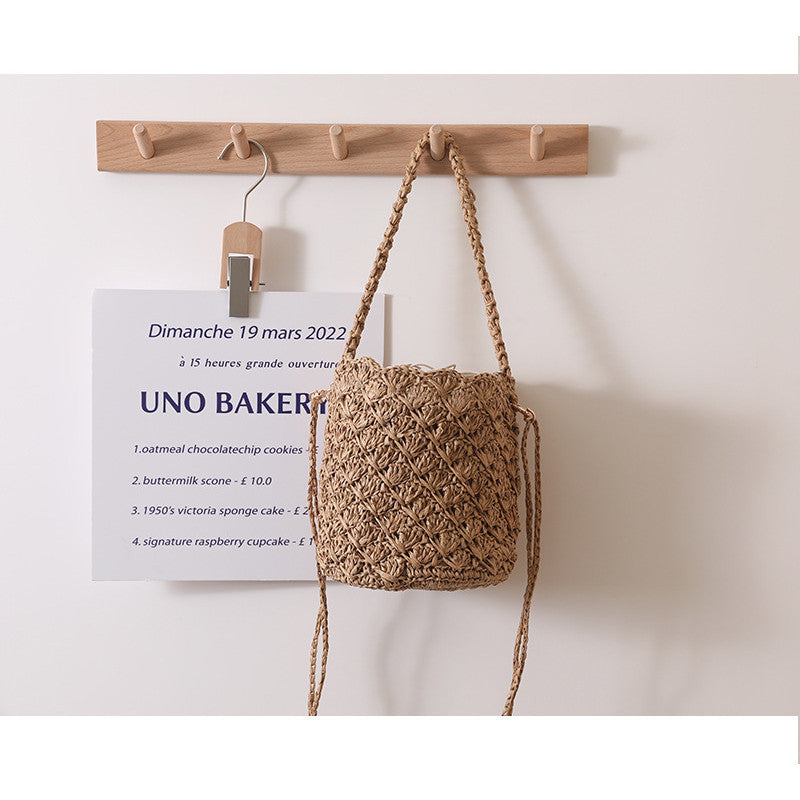 Ielgy Niche Design Straw Bucket Bag French Retro Crossbody Portable Woven Vacation Beach Bag