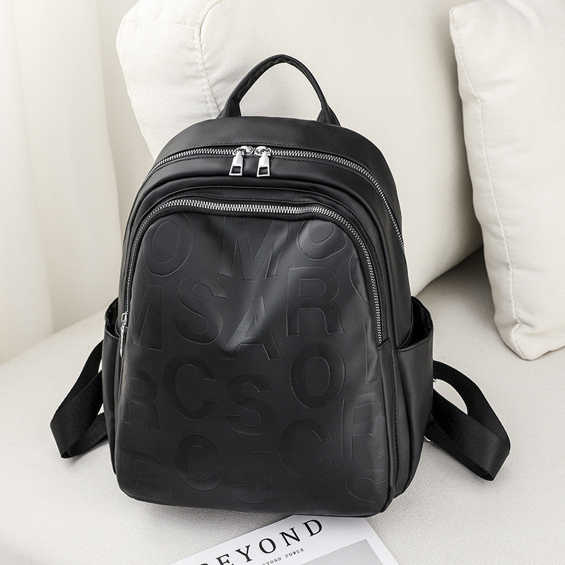 Ielgy Ladies PU Soft Leather Texture Backpack Fashion Letter Printing Travel Bag Simple Lightweight Commuter Bag
