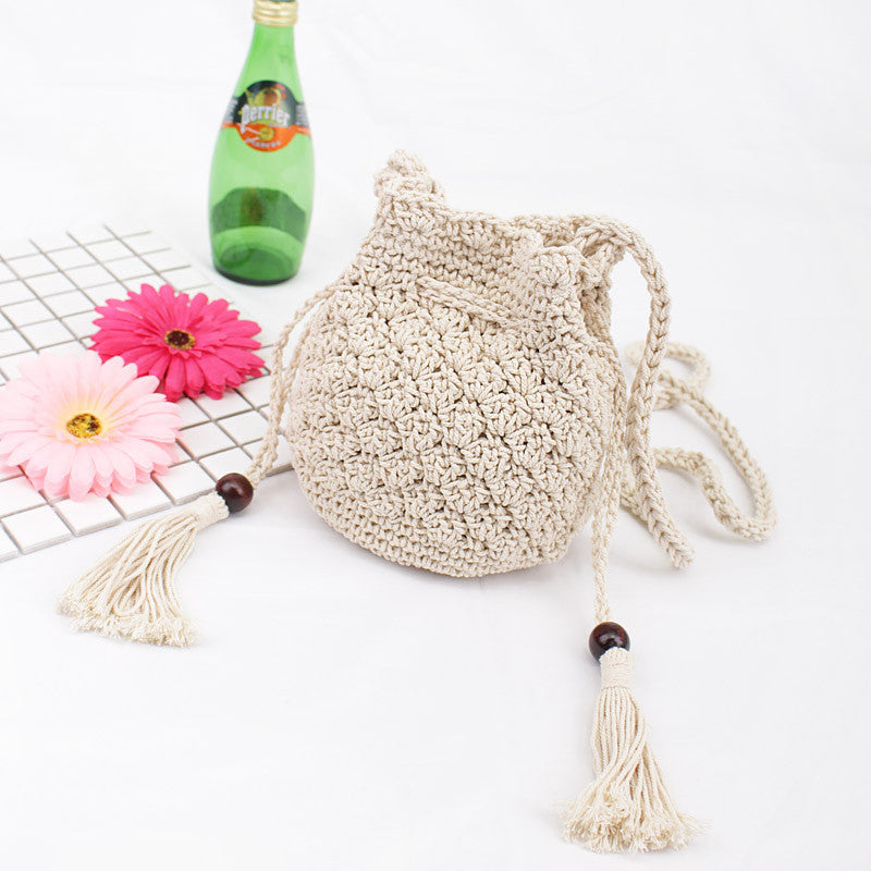 Ielgy Korean Version Cotton Thread Tassel Drawstring Bucket Bag Simple Straw Beach One-Shoulder Woven Mini Messenger Female Bag