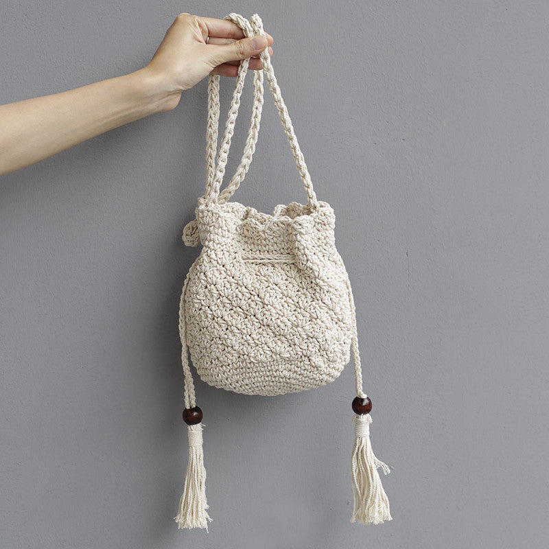 Ielgy Korean Version Cotton Thread Tassel Drawstring Bucket Bag Simple Straw Beach One-Shoulder Woven Mini Messenger Female Bag