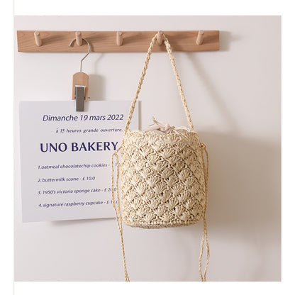 Ielgy Niche Design Straw Bucket Bag French Retro Crossbody Portable Woven Vacation Beach Bag