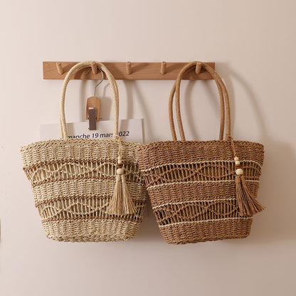 Ielgy Fashion Hollow One-Shoulder Straw Bag Tassel Portable Woven Holiday Style Beach Female Bag