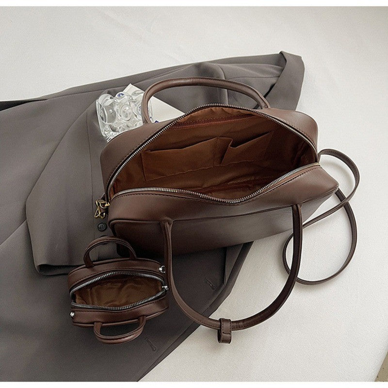 Ielgy Fashion Niche Bowling Briefcase Large Capacity Commuter Handbag One Shoulder Diagonal
